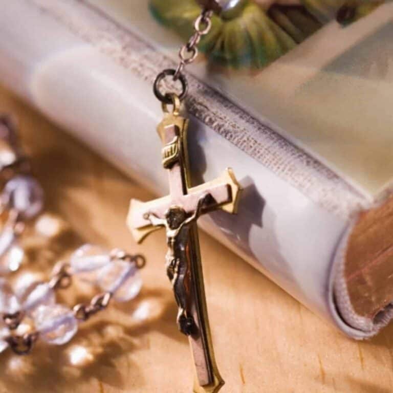 missal prayer book with rosary