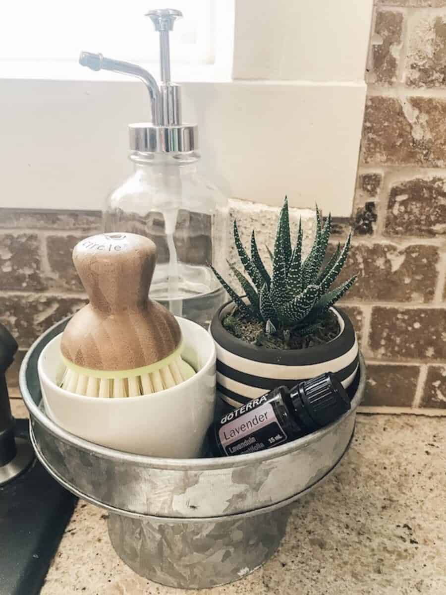 scrub brush with soap and essential oils