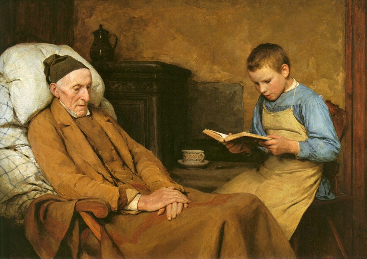 little boy reading to his grandfather. 