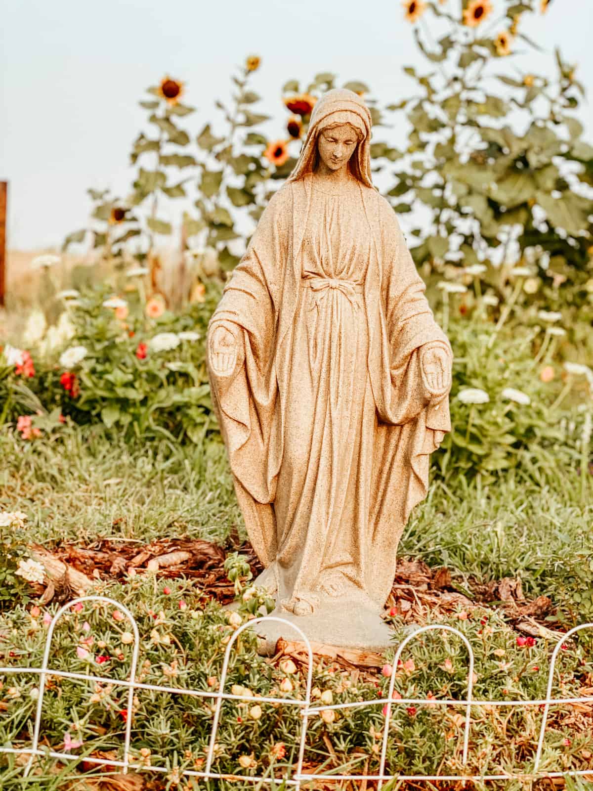 outdoor blessed mother statute in the Mary garden.