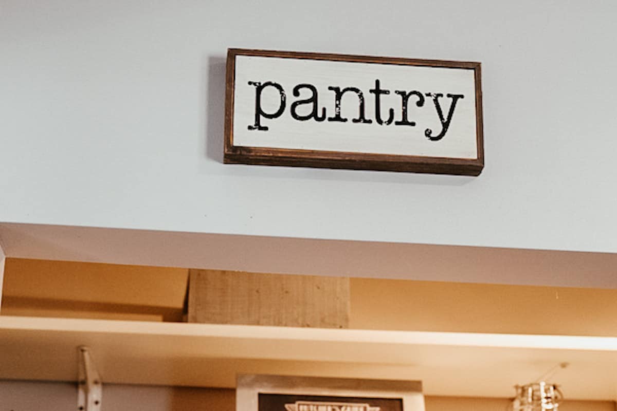 farmhouse pantry sign hanging above doorway