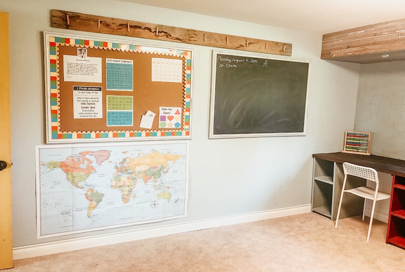 chalkboard and map wall in homeschool classroom