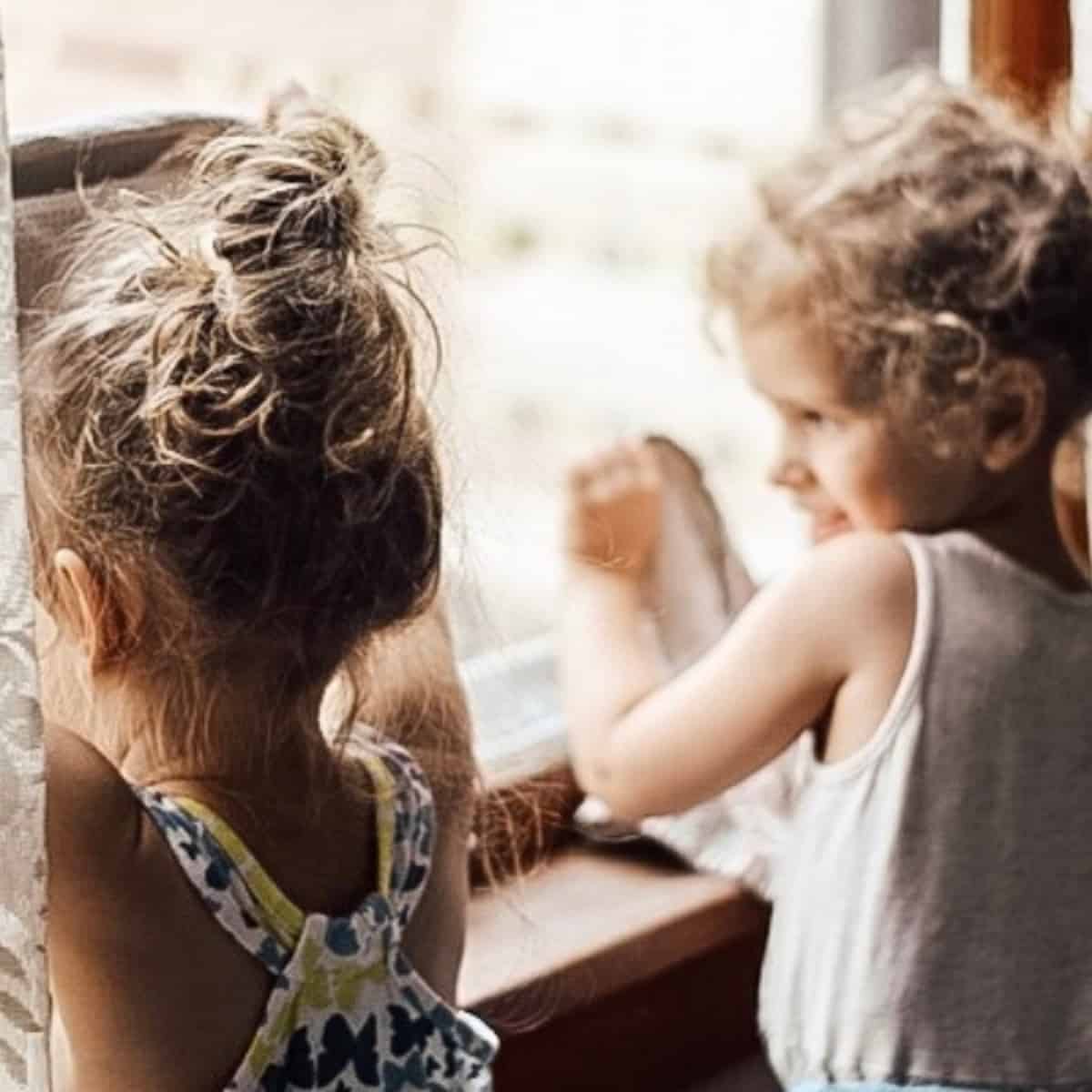 children working on chores and cleaning windows