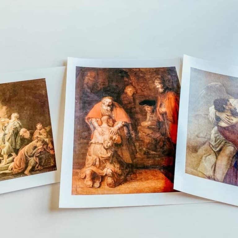 scattered images of Rembrandt paintings on the table