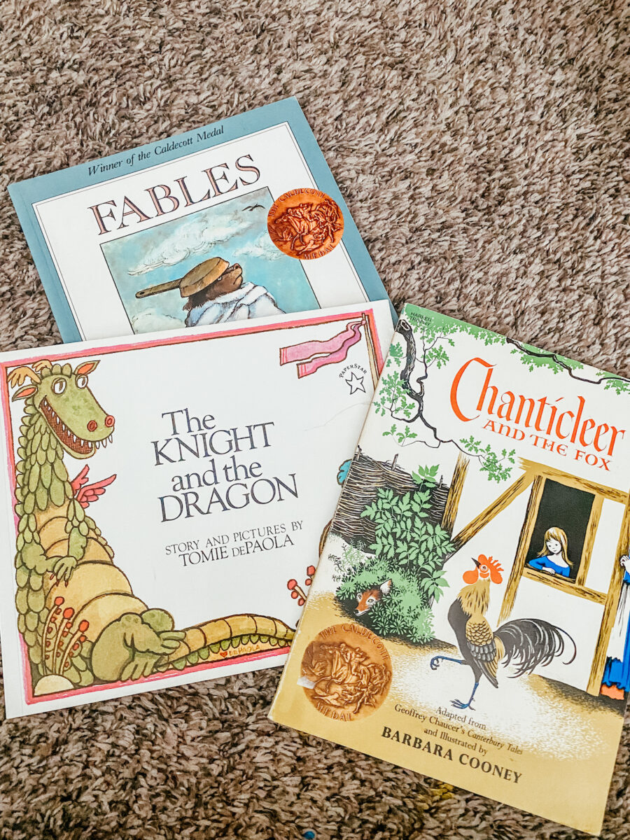 stack of picture books on the floor. 