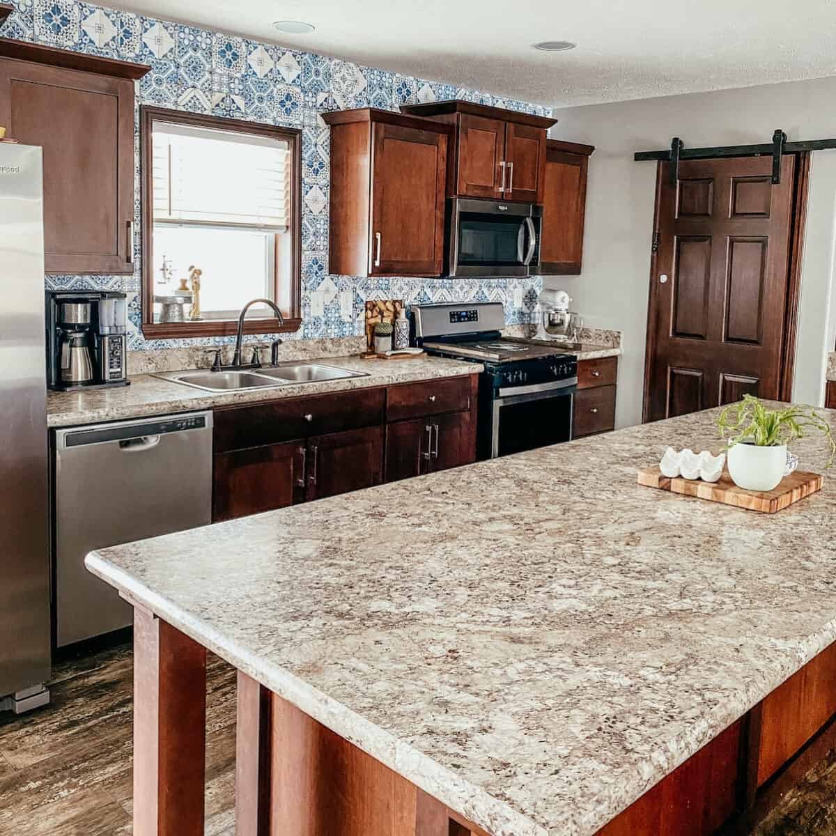 kitchen view with window in background and island in foreground