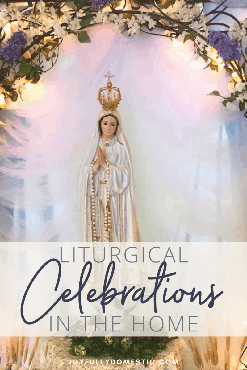 statue of our lady of fatima with floral decorated arch