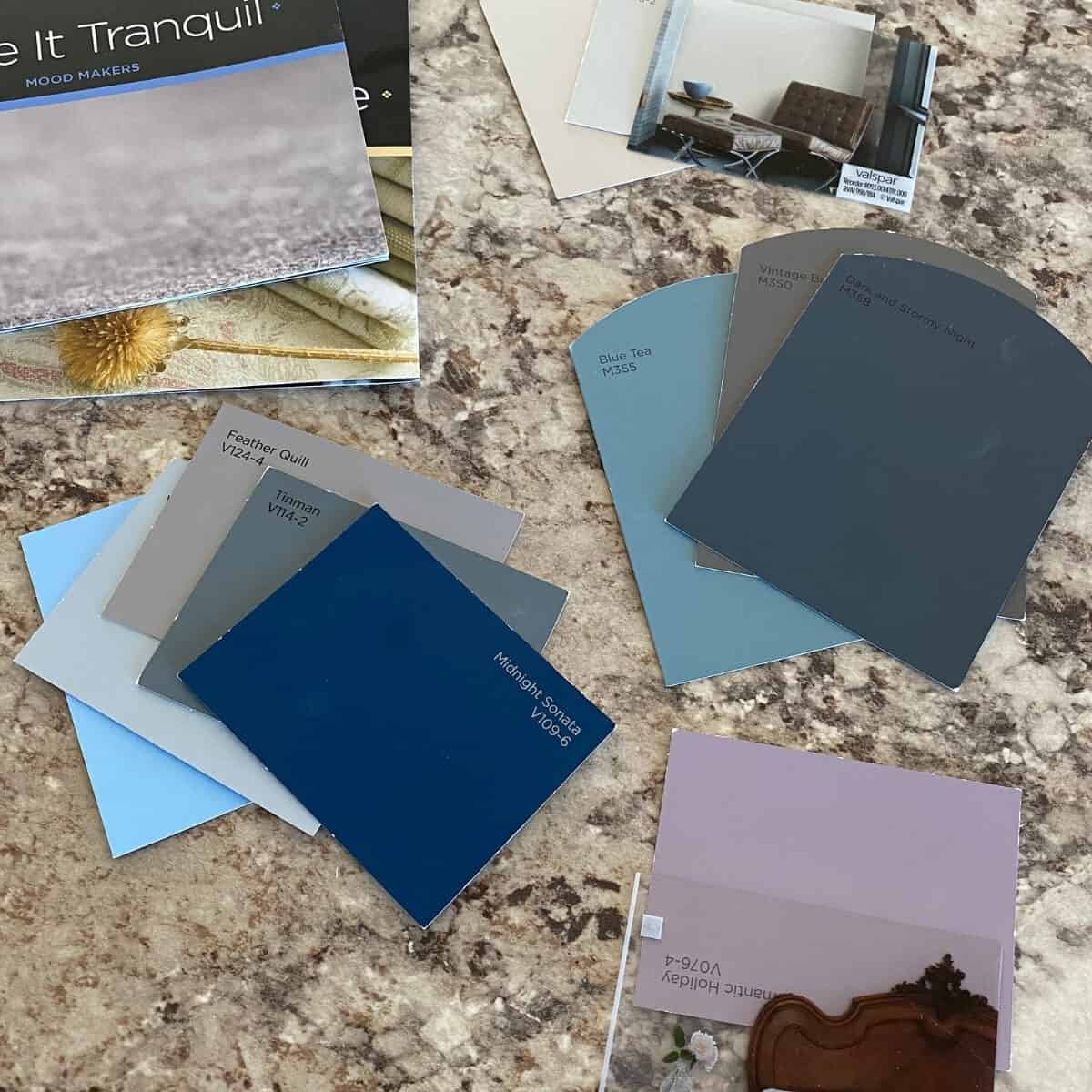 paint color samples on a countertop 