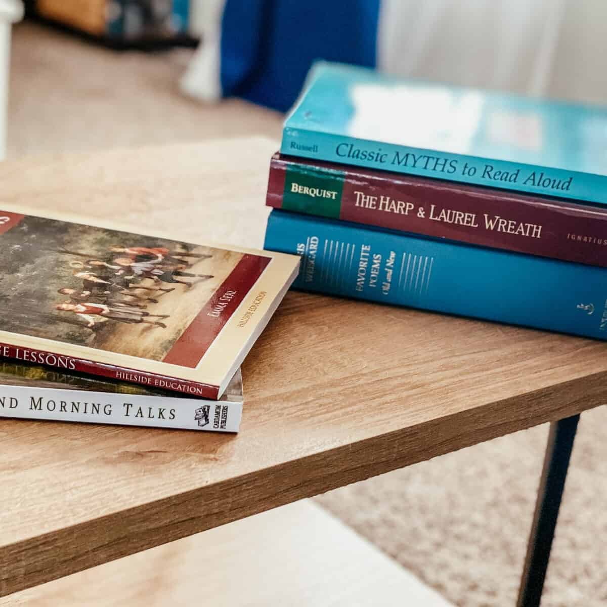 stack of poetry and other living books which are a component of a Charlotte Mason method of homeschooling