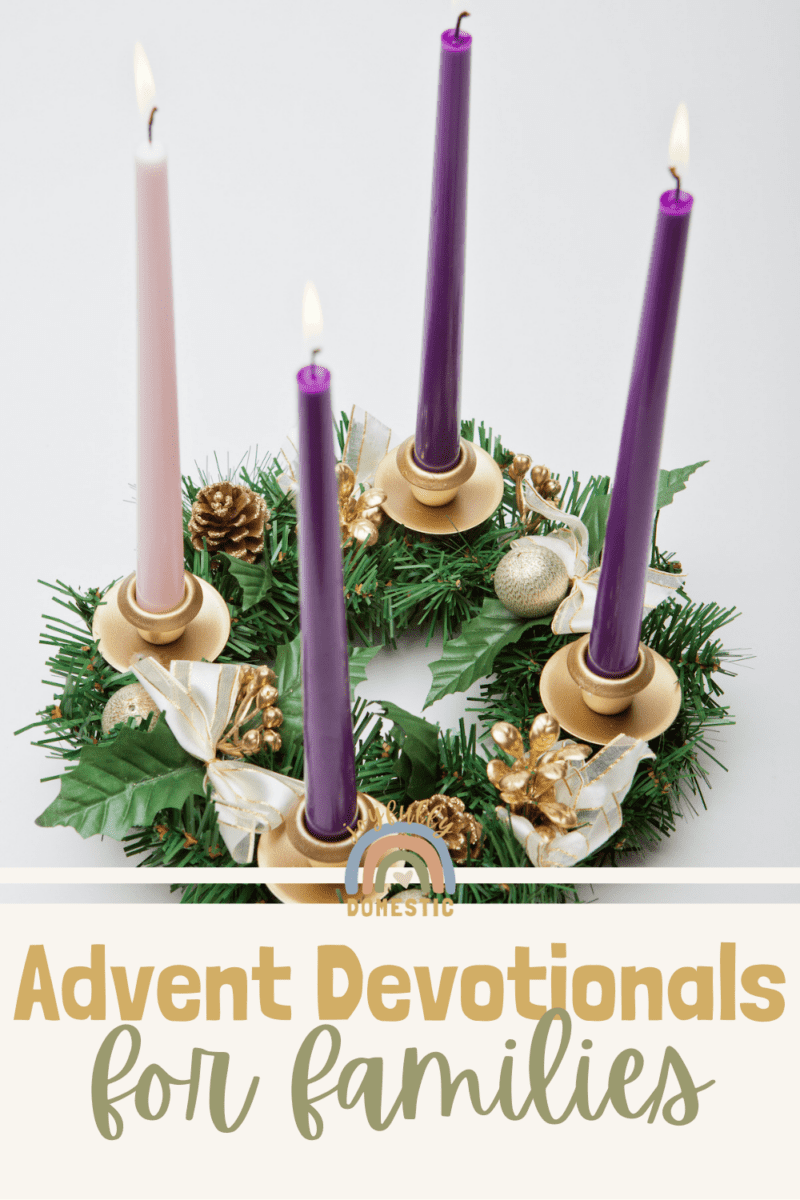 advent wreath with 4 purple and pink candles