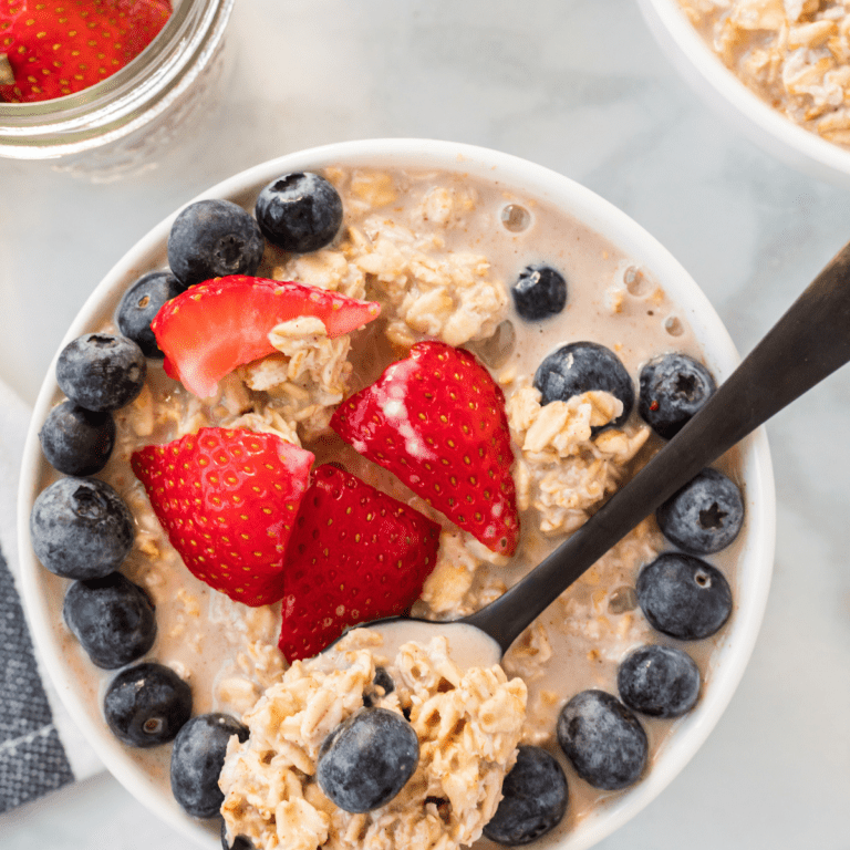 maple overnight oats with fresh berries on top