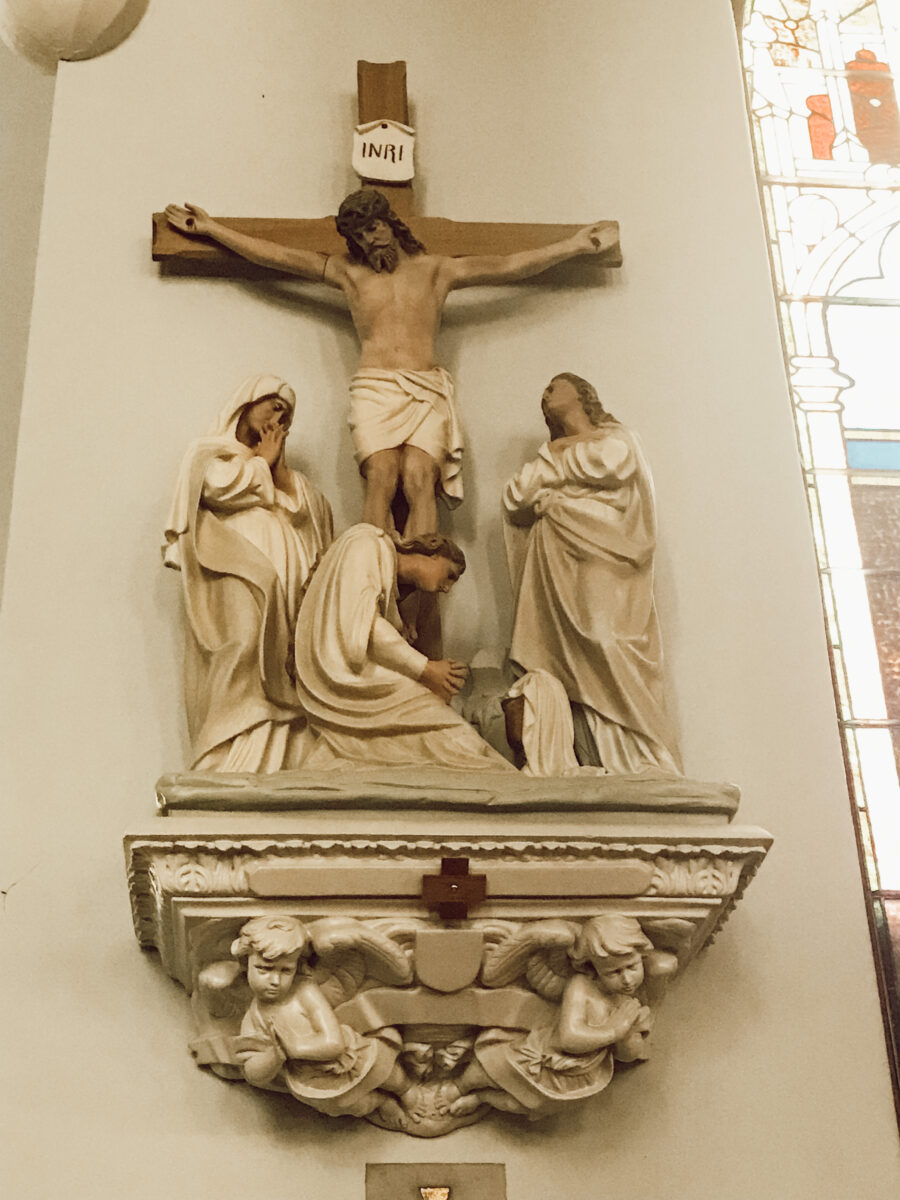 stations of the cross inside of a Catholic Church. 