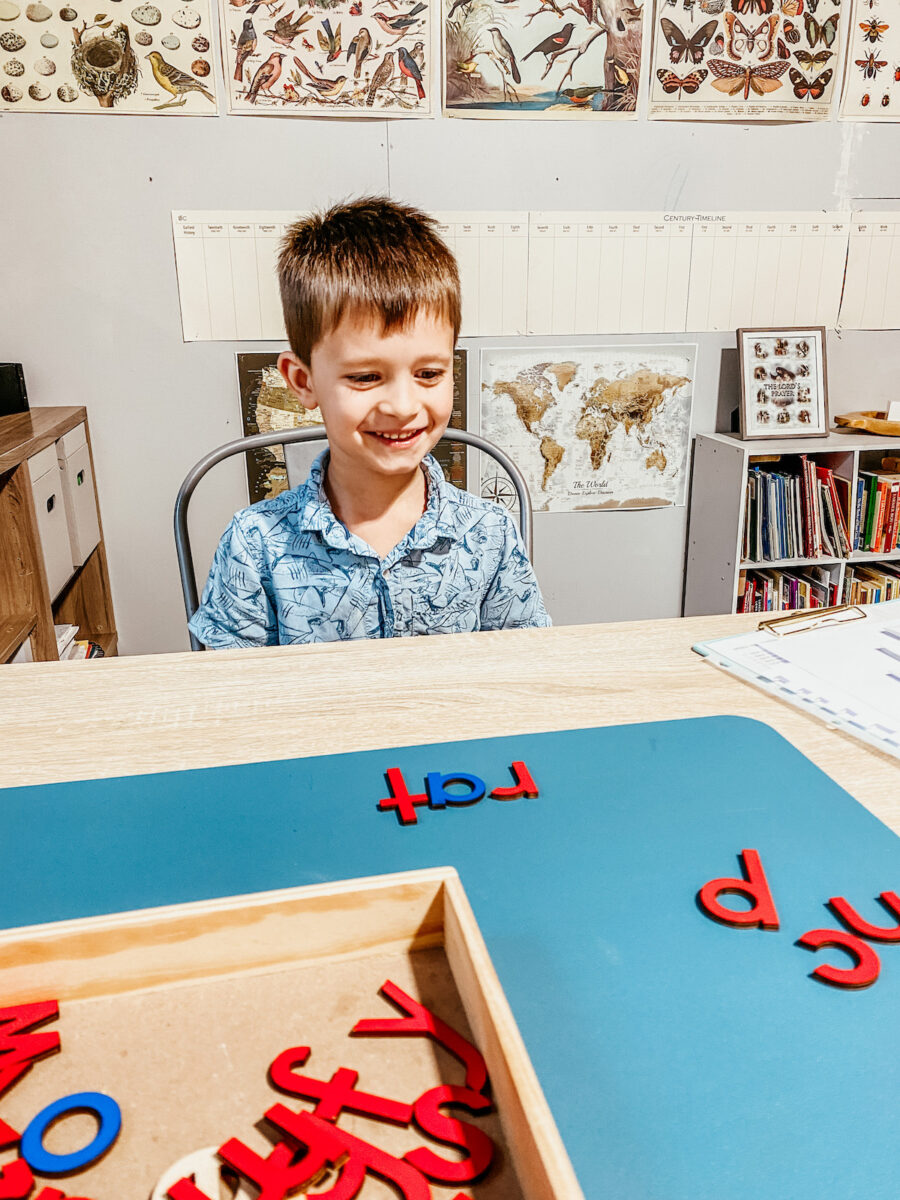 teaching a Charlotte Mason reading lesson using wooden blocks. 