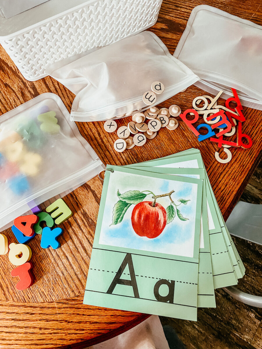 abc letters printed and laminated with wooden letters.