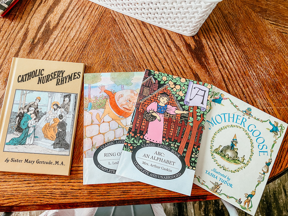 nursery rhyme books spread on a table. 