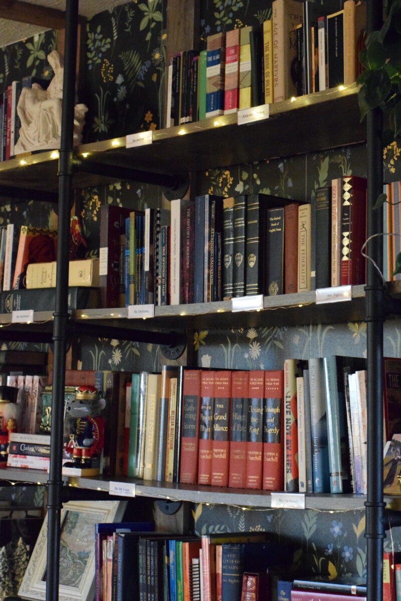 home library with a view of some of the book shelves.