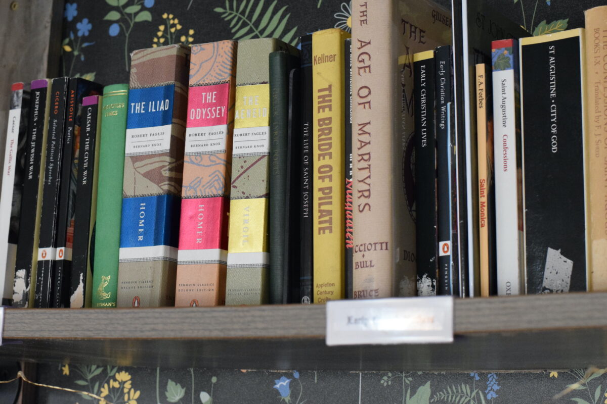 books from ancients and early church fathers on a book shelf. 