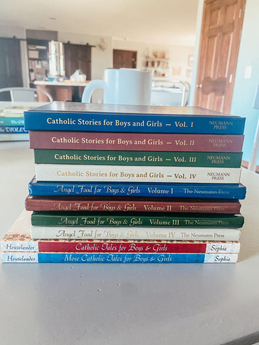 Stack of children’s books on the table. 