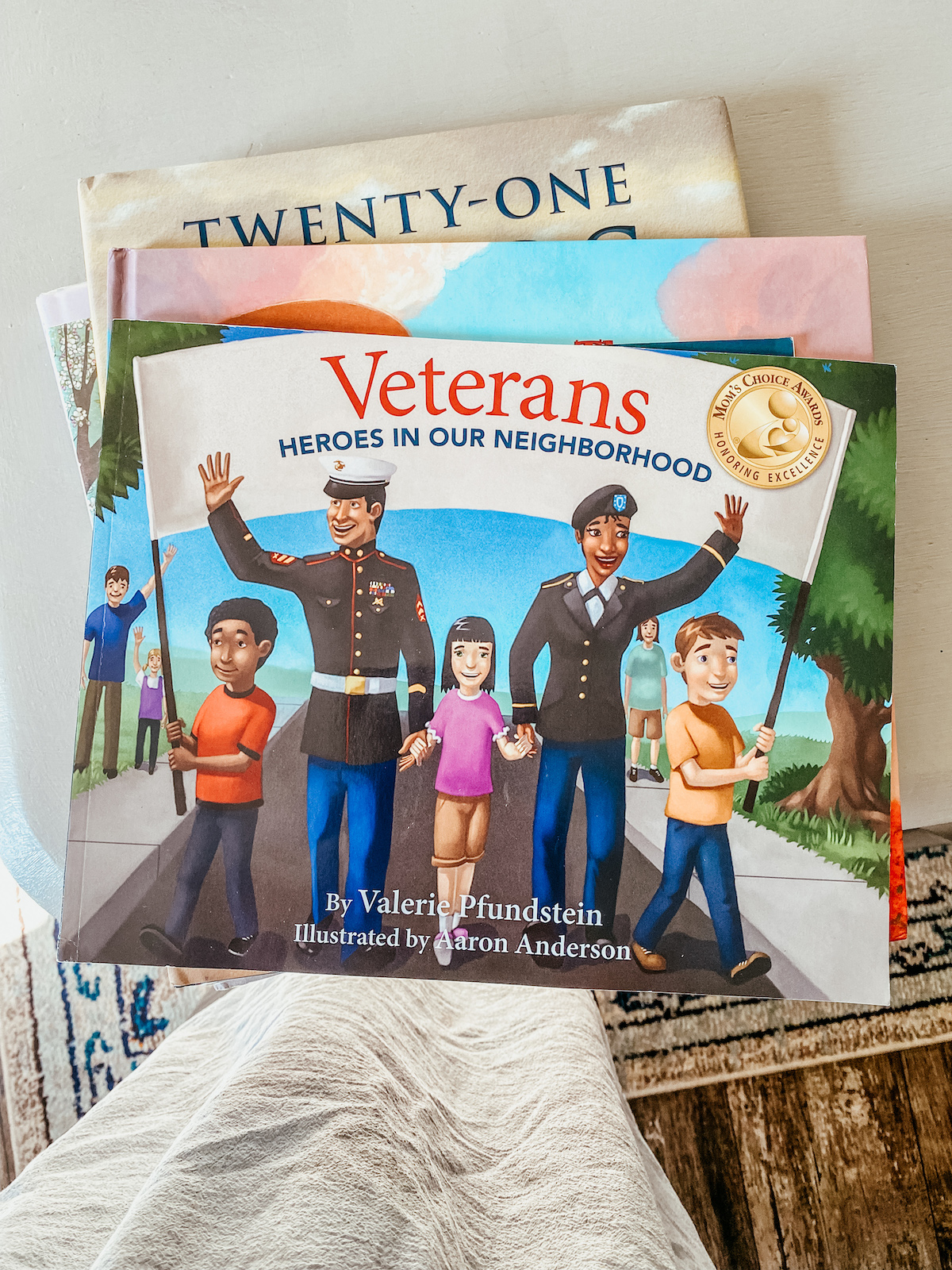 stack of patriotic picture books on the table.