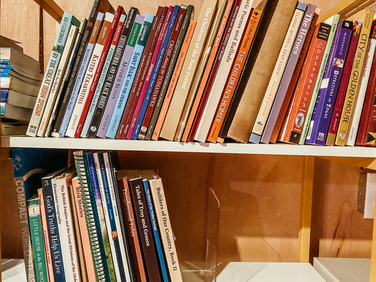 school books on a bookshelf.