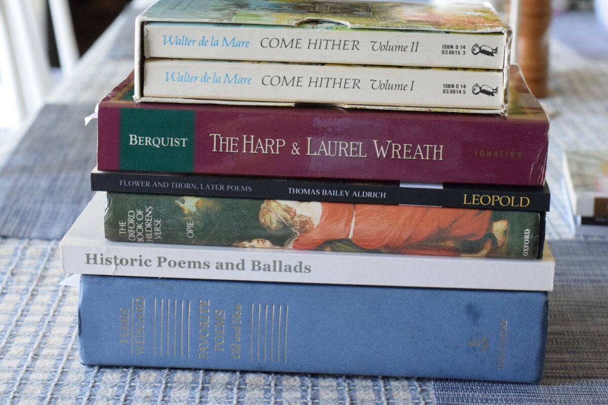 stack of year 4 poetry books on a table. 