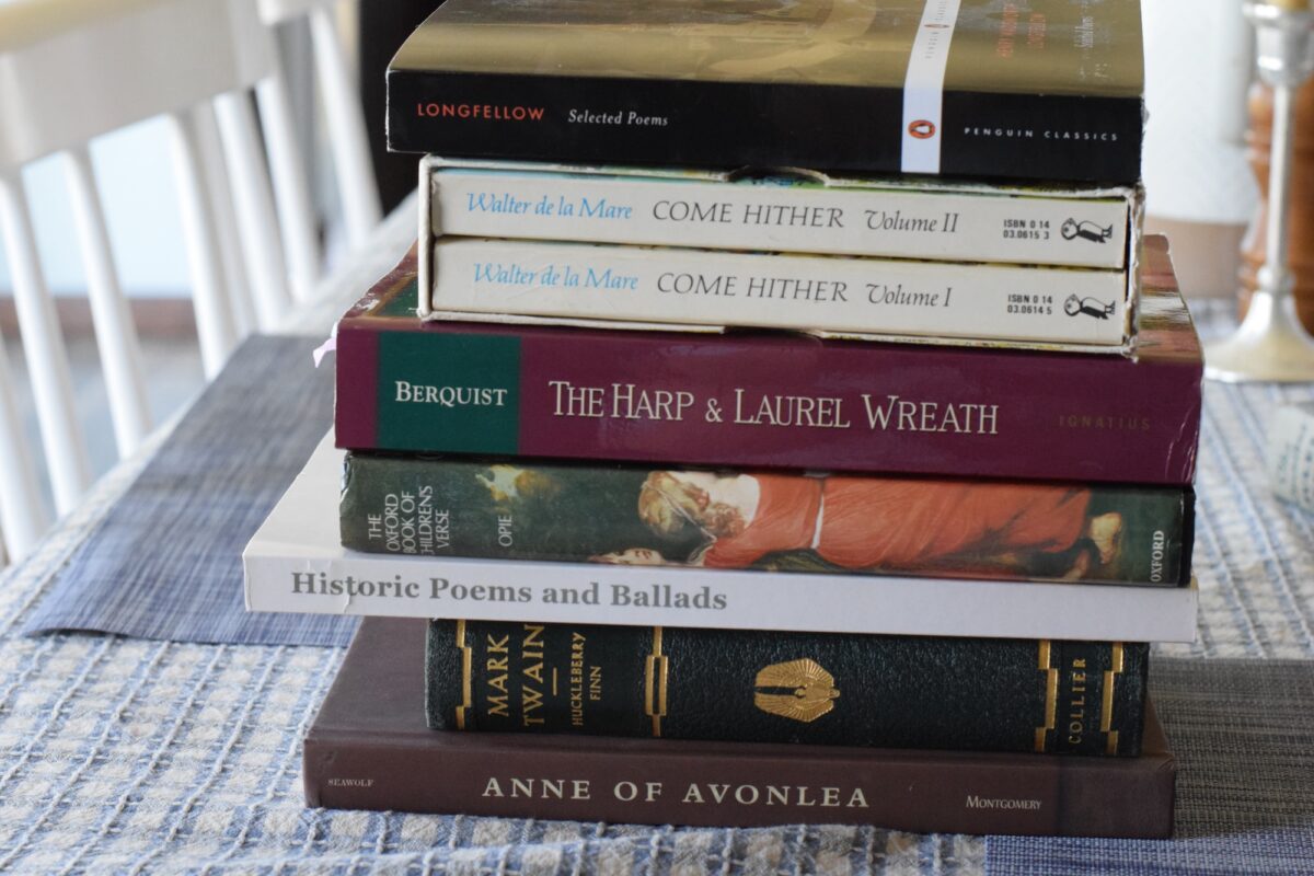 year 6 literature and poetry books stacked on a table. 