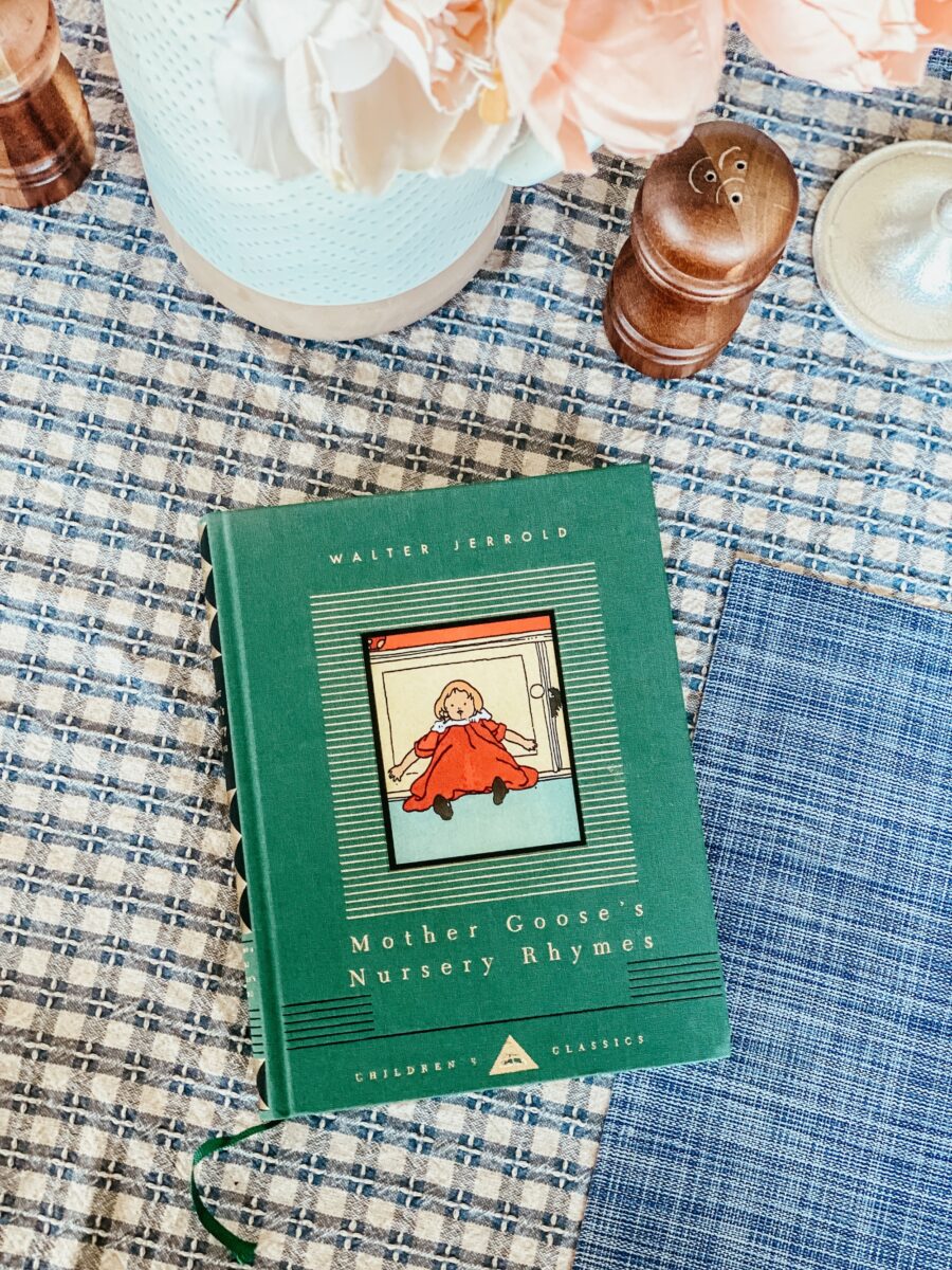 Mother Goose book on a dining table. 