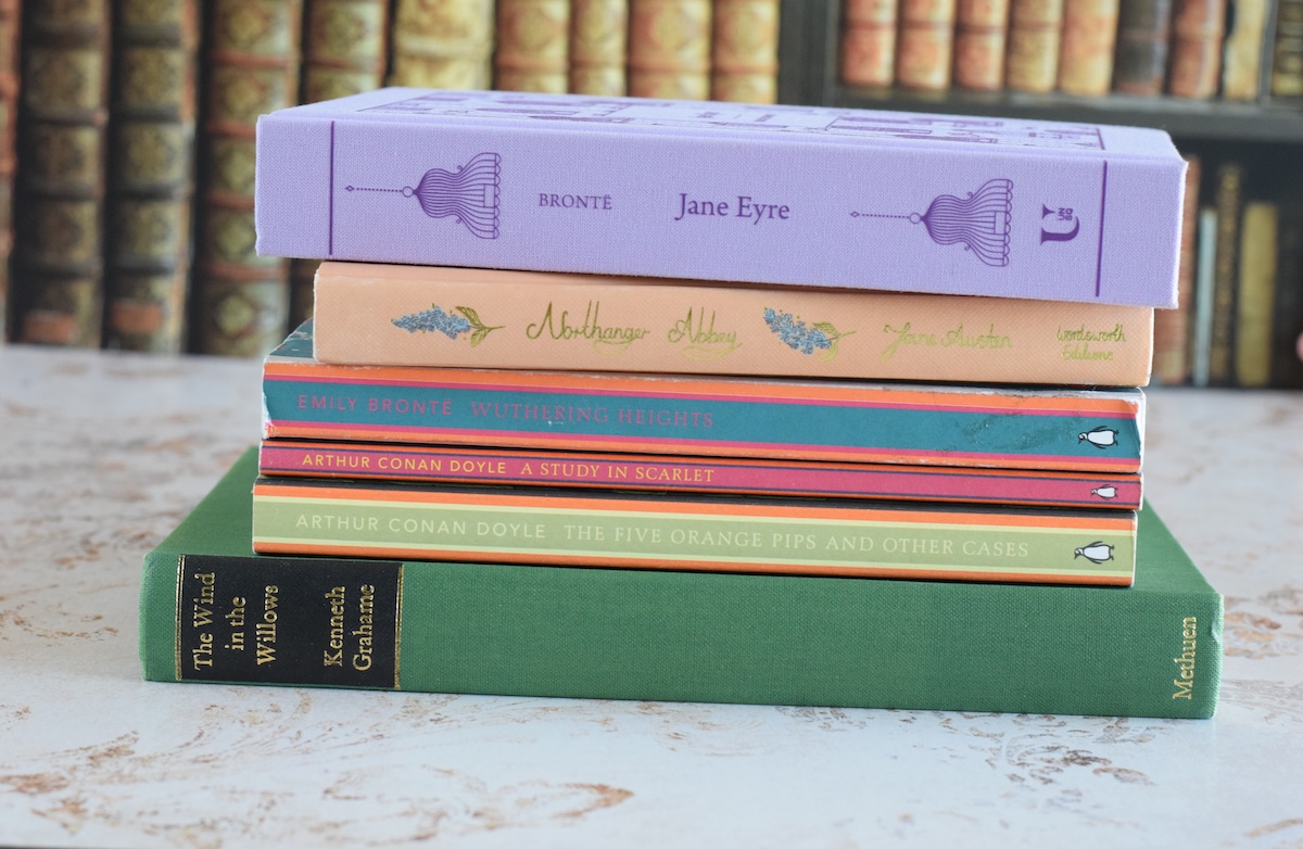 stack of fall books on a table. 