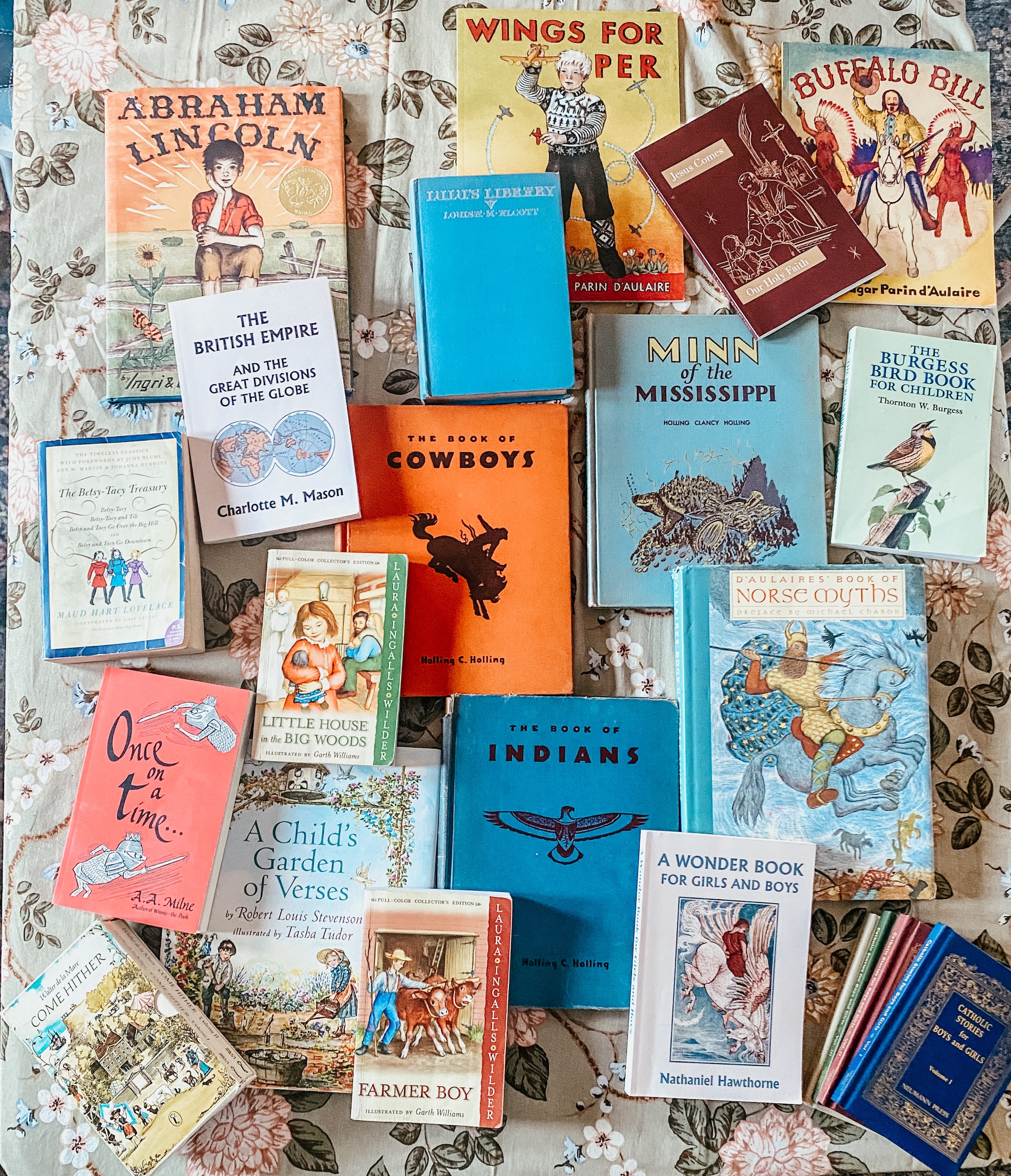 year 2 books spread out on dining table.