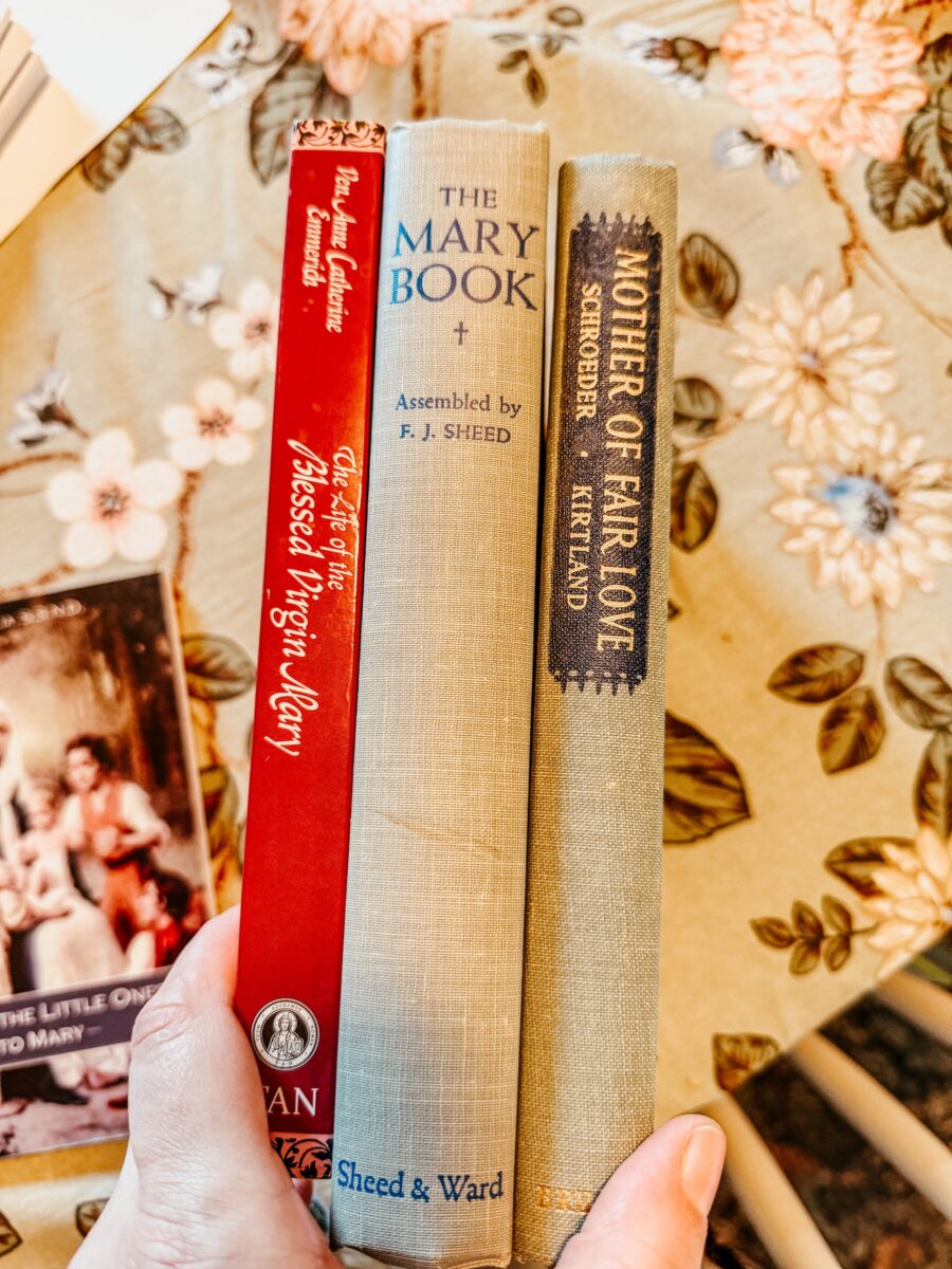 stack of devotional books in honor of the Blessed Mother. 